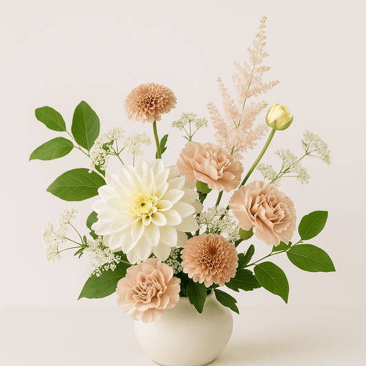 Pastel Bouquet with white and cream flowers arranged in a ceramic vase by Marietta Floral Design